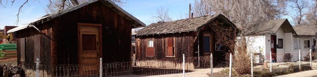 Two small rustic cabins
