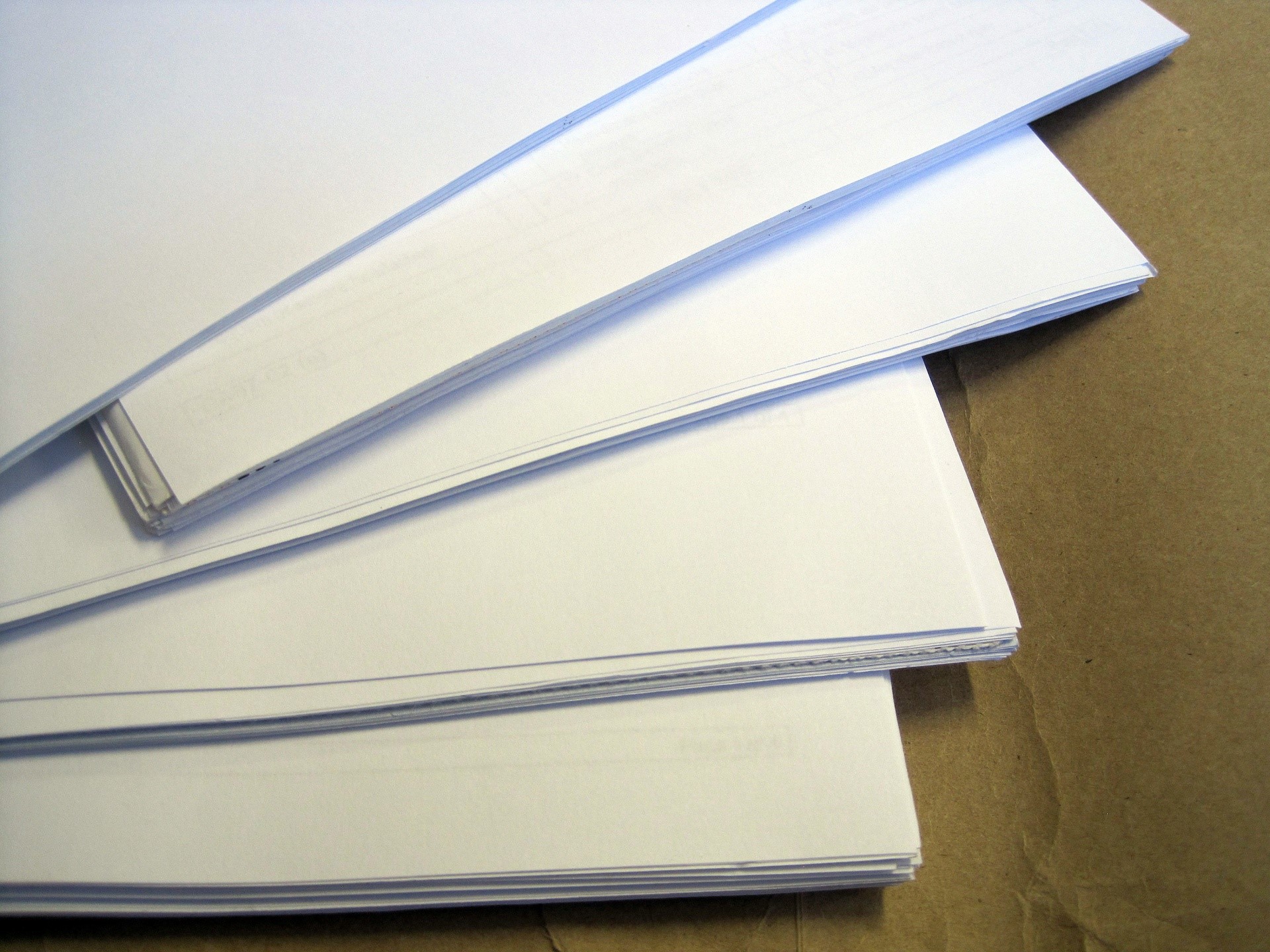 five stacks of paper fanned out