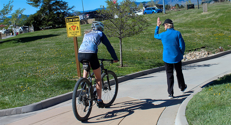 bike passing a pedestrian