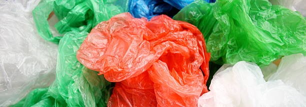 Close-up of plastic bags of different colors.
