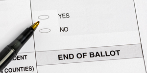 Ballot with Yes or No options and a pen
